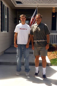 Phil and his Dad: Whos taller?? HEY, no tippy toes!