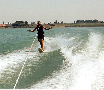waterskiing with the rope held between his teeth! June 2003